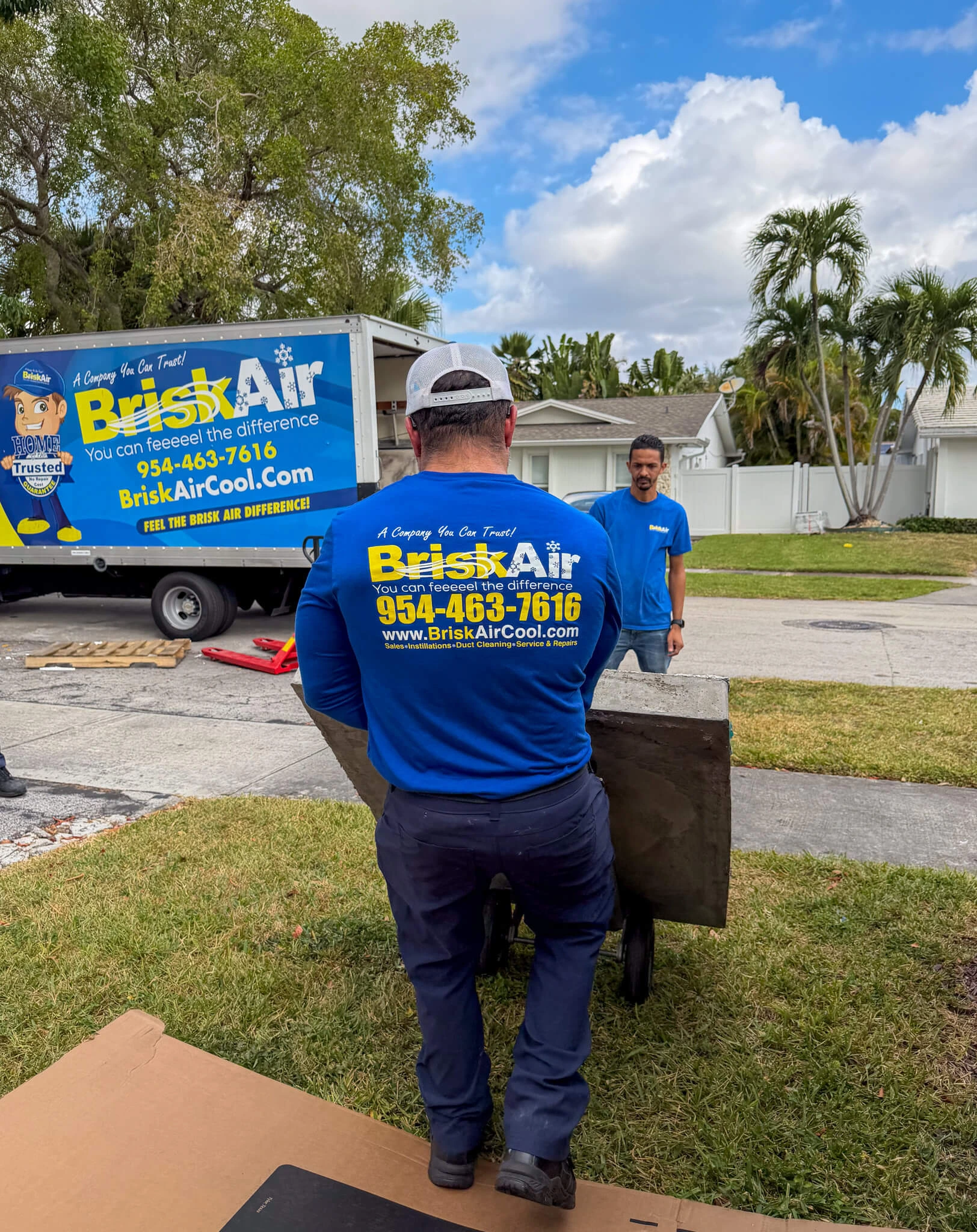 Brisk Air crew outside after air conditioning service Coral Springs FL