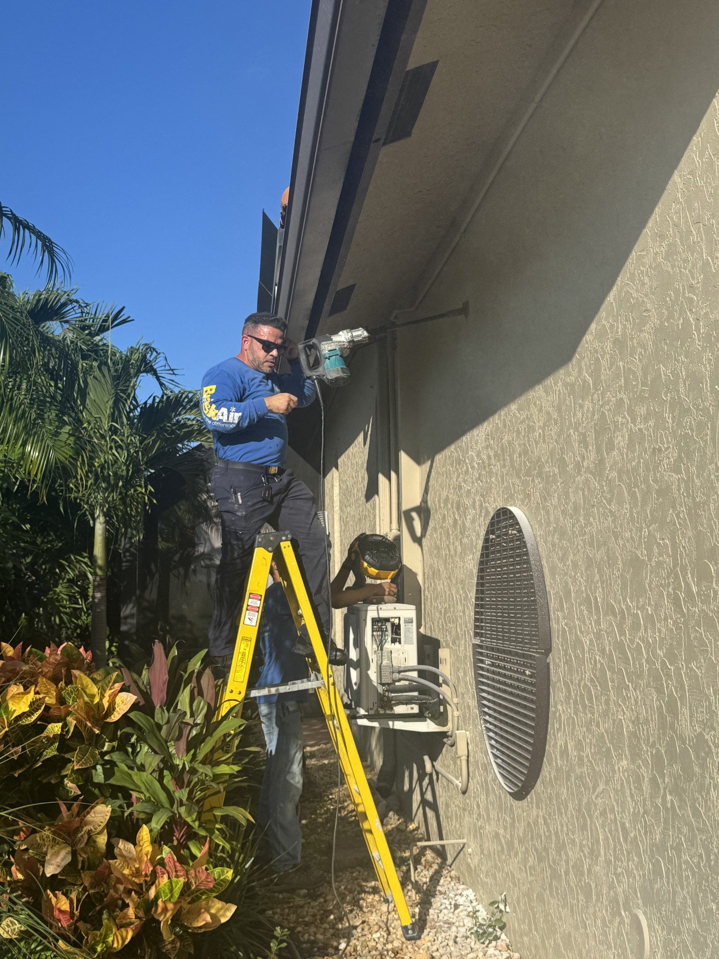 professional doing HVAC service Coral Springs FL