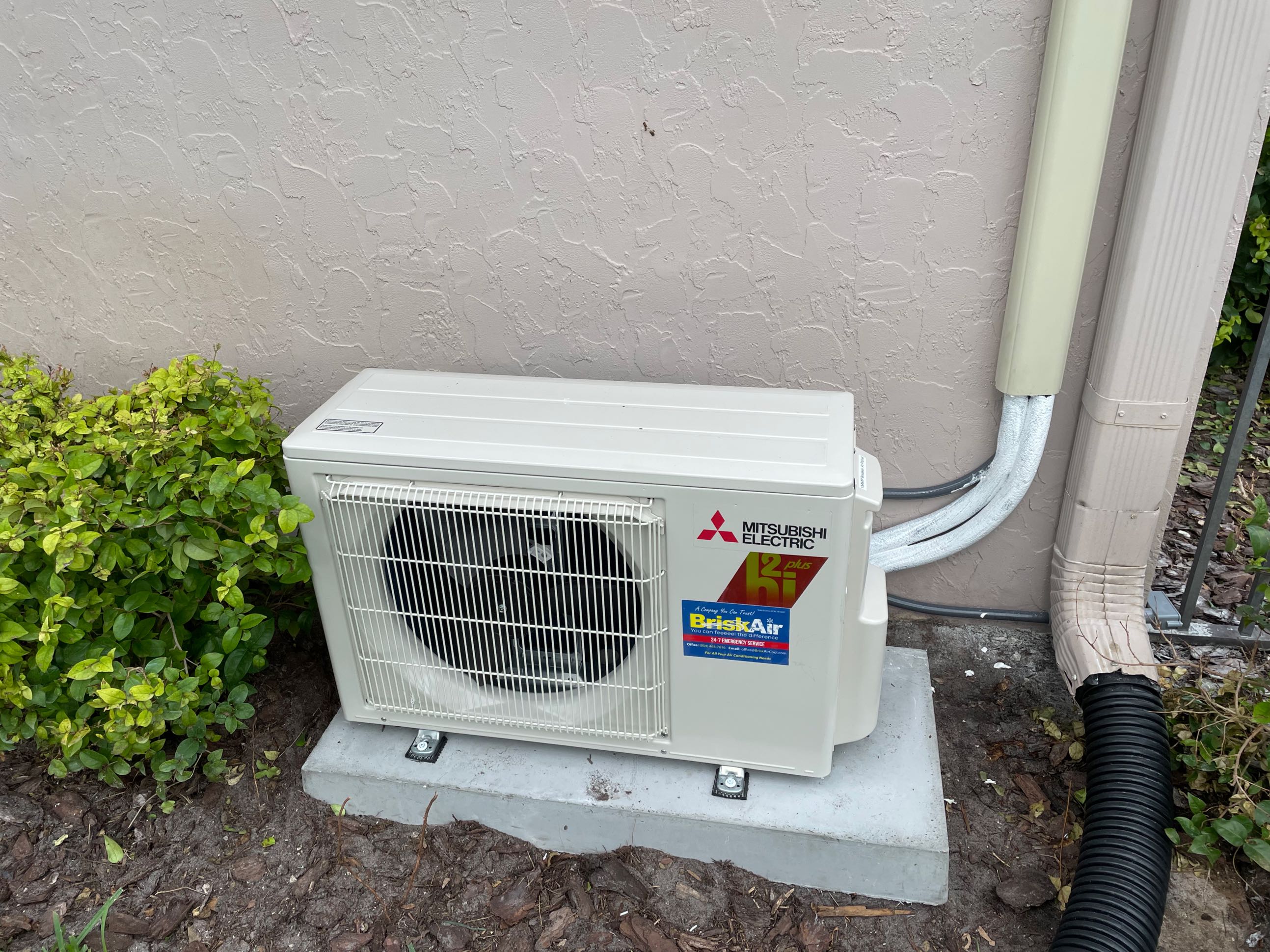 white AC outside needs AC services Coral Springs