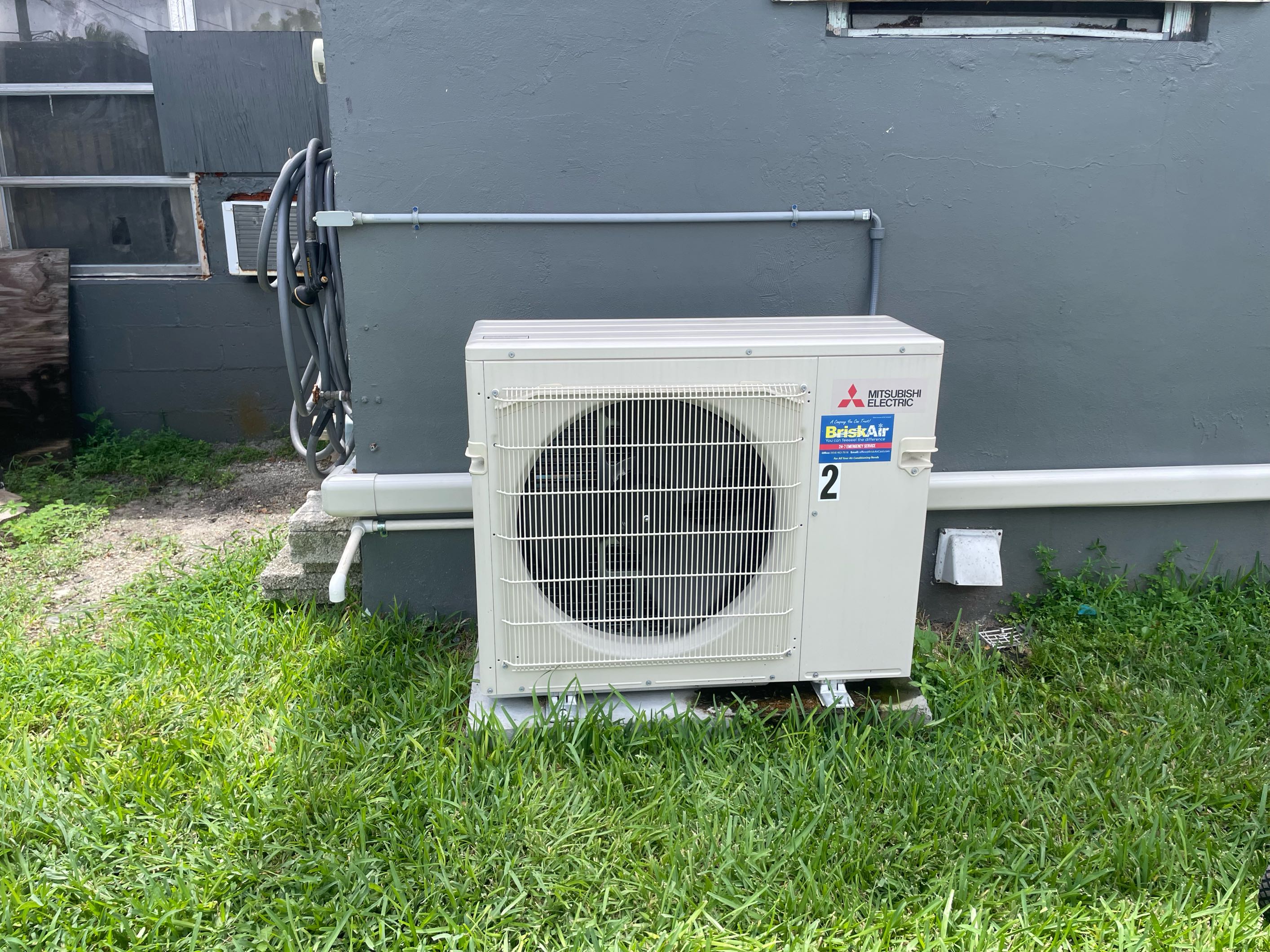 white AC unit outside needs AC services Coral Springs