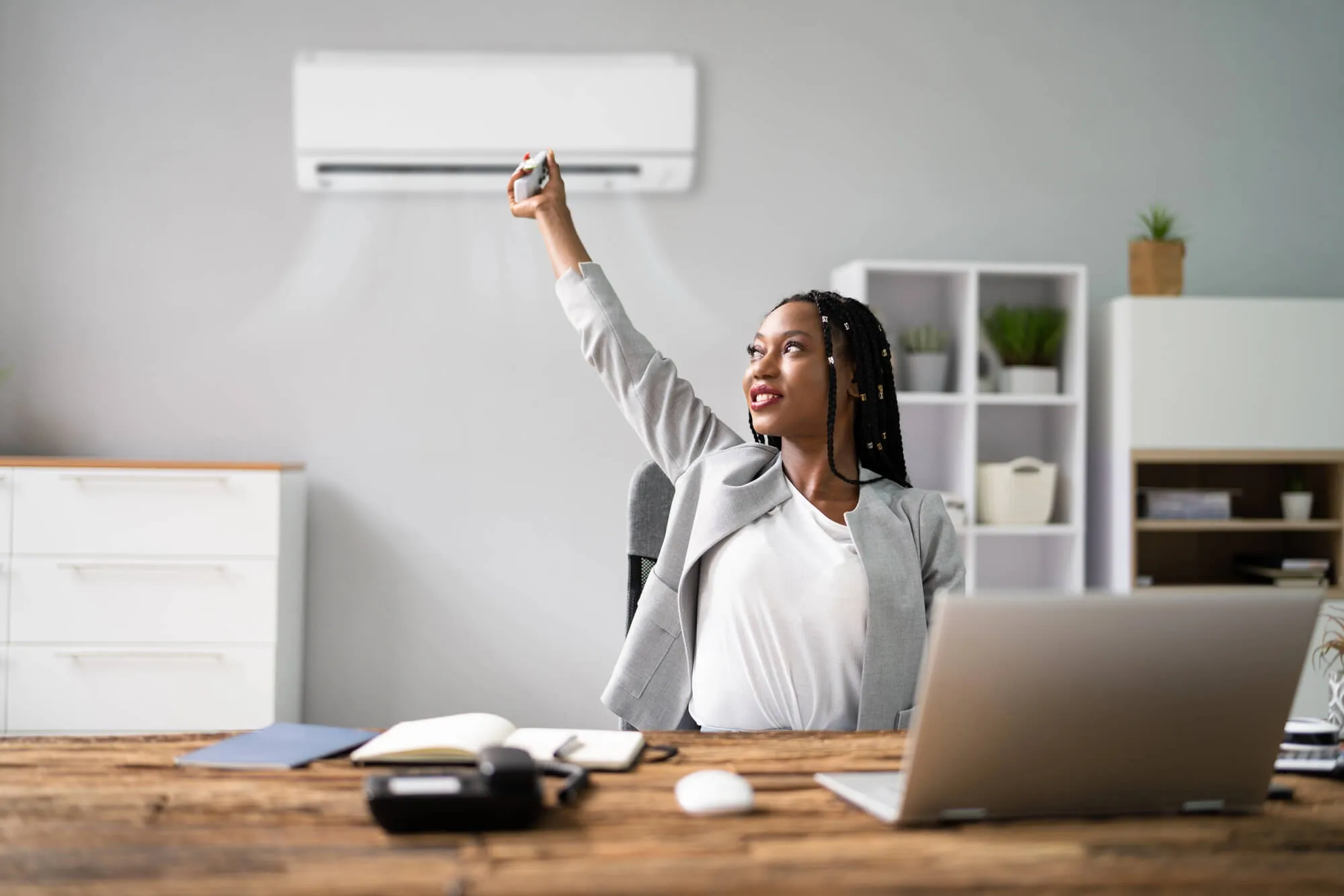 woman in office with commercial air conditioning coral springs fl